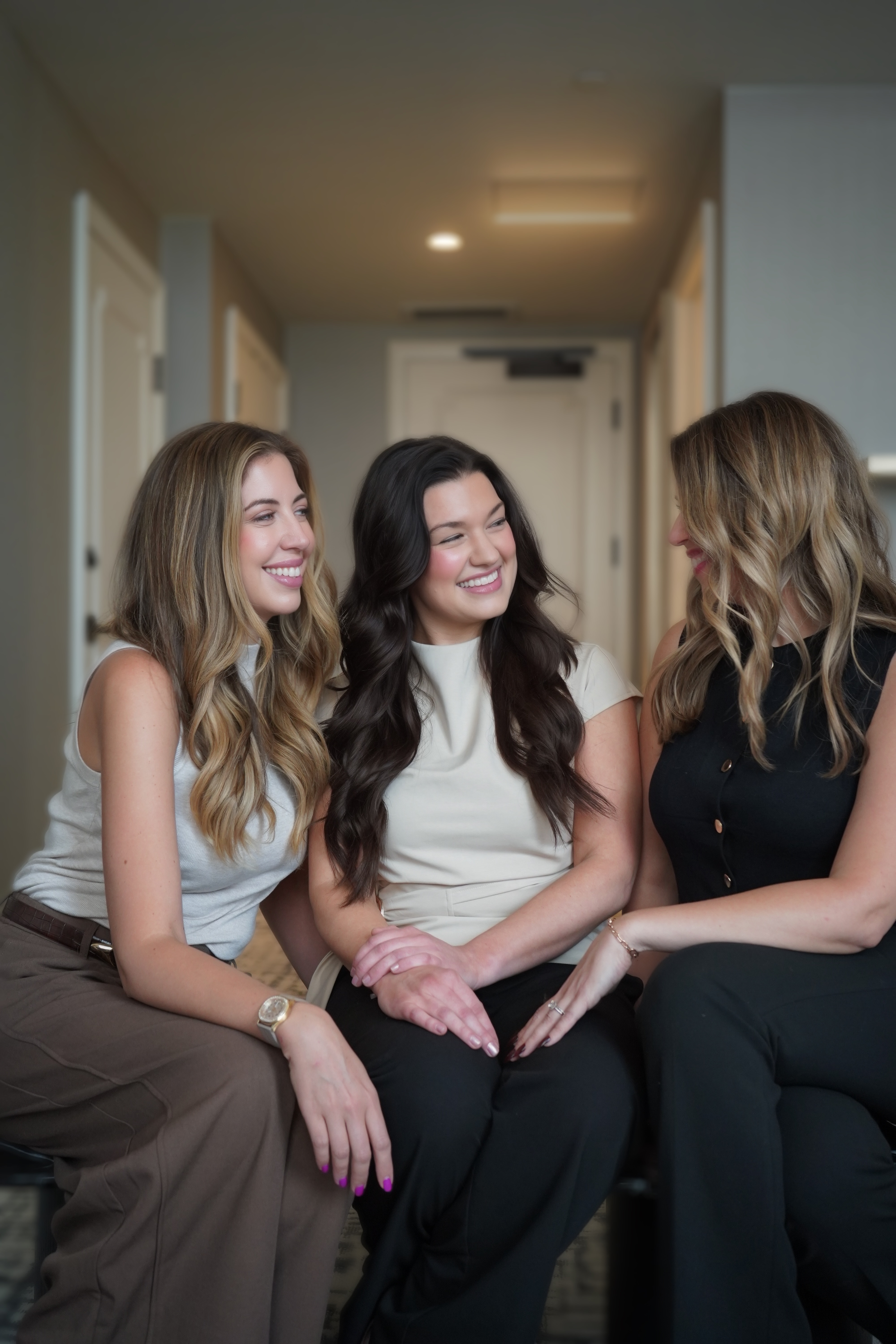 The Üesthetics Indy team, laughing together